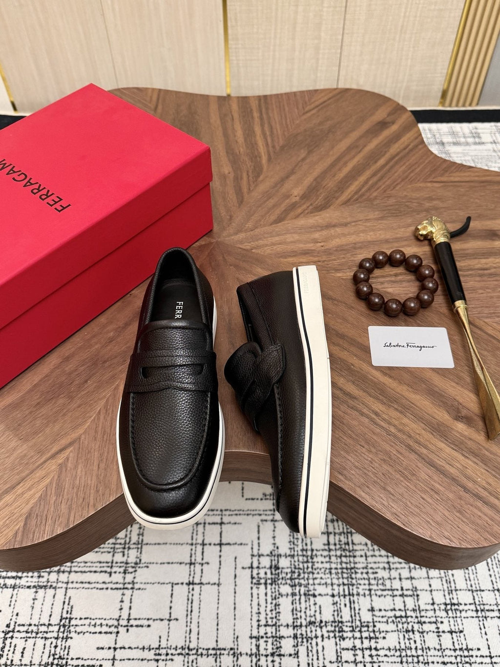 Salvatore Ferragamo Black Loafers with White Soles